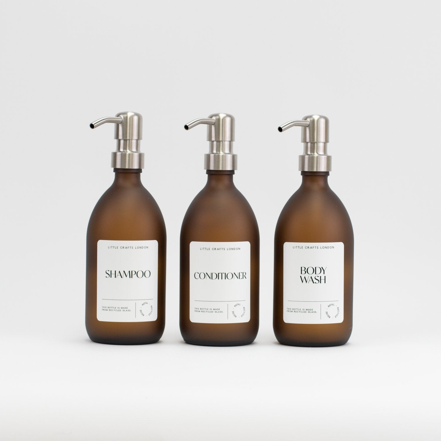 Set of 3 Bathroom Reusable Frosted Amber Glass Bottles 500 ML with Stainless Steel Pump - Little Crafts London