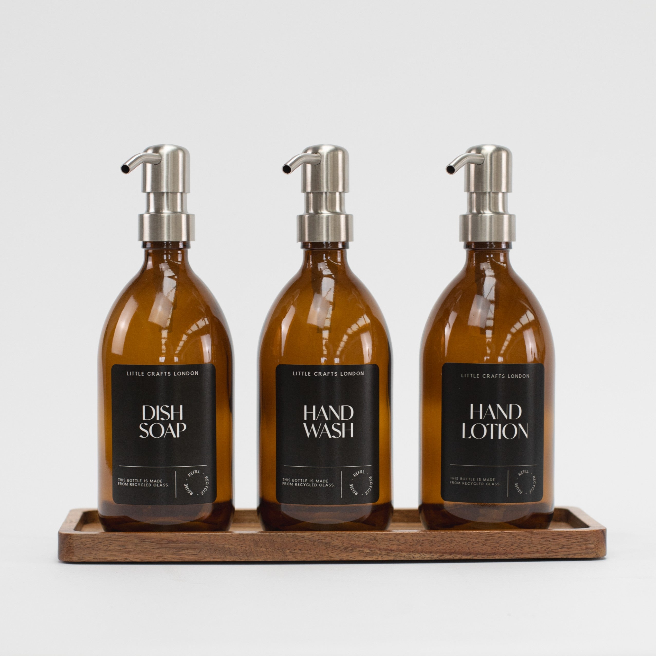 Set of 3 Reusable Amber Glass Bottles 500 ML with Stainless Steel Pump and Acacia Wood Tray (Black Label) - Little Crafts London